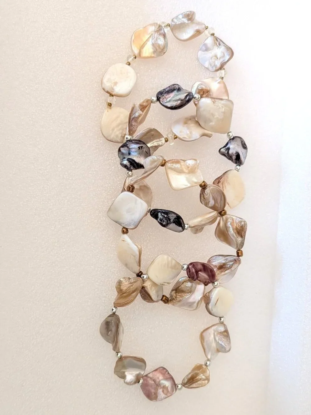 Set of 4 polished shell stretch bracelets-neutral tones
